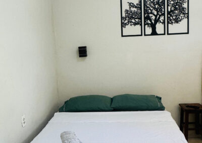 Foto da cama de casal em um dos quartos
